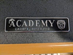 Academy Ford dealer emblem